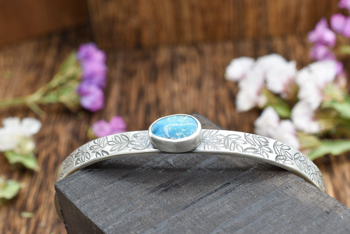 Turquoise Cuff Bracelet with Stamped Petals Design